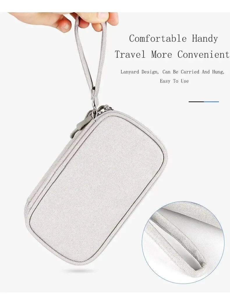 Light grey travel organizer pouch with lanyard for portable electronics storage