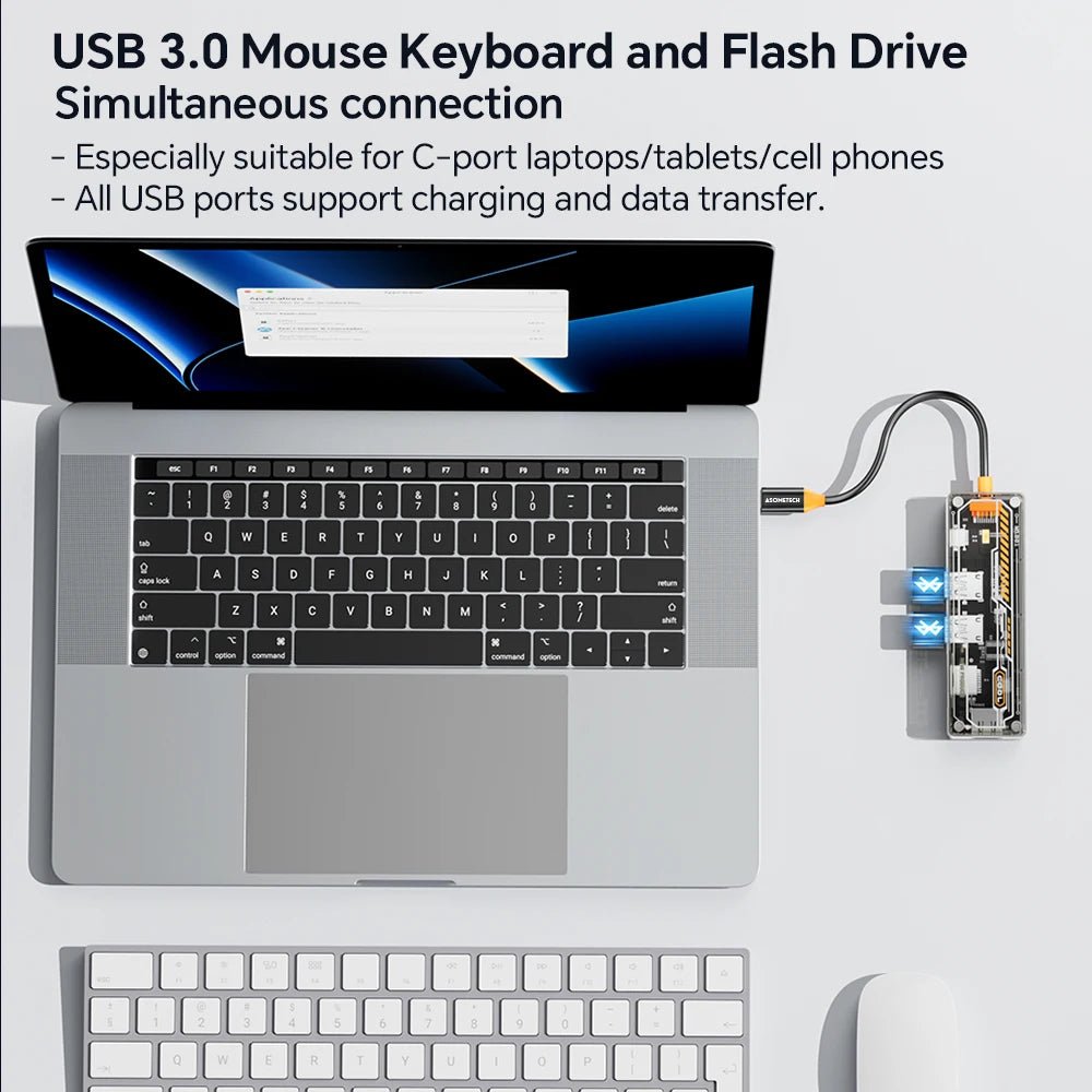 USB 3.0 hub connected to a laptop with an external keyboard and mouse.