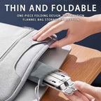 Caelix laptop stand, alternate angle — folded flat for a bag