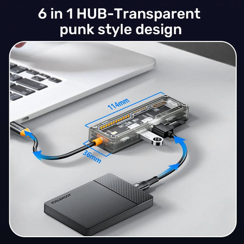 Transparent 6-in-1 USB-C hub with punk style design connected to a laptop and external drive.