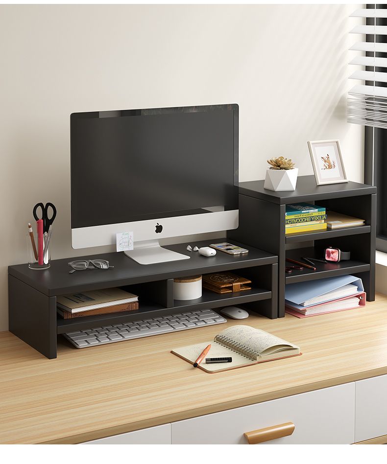 Black wooden desk organizer with monitor stand and storage shelves on a light wood desk